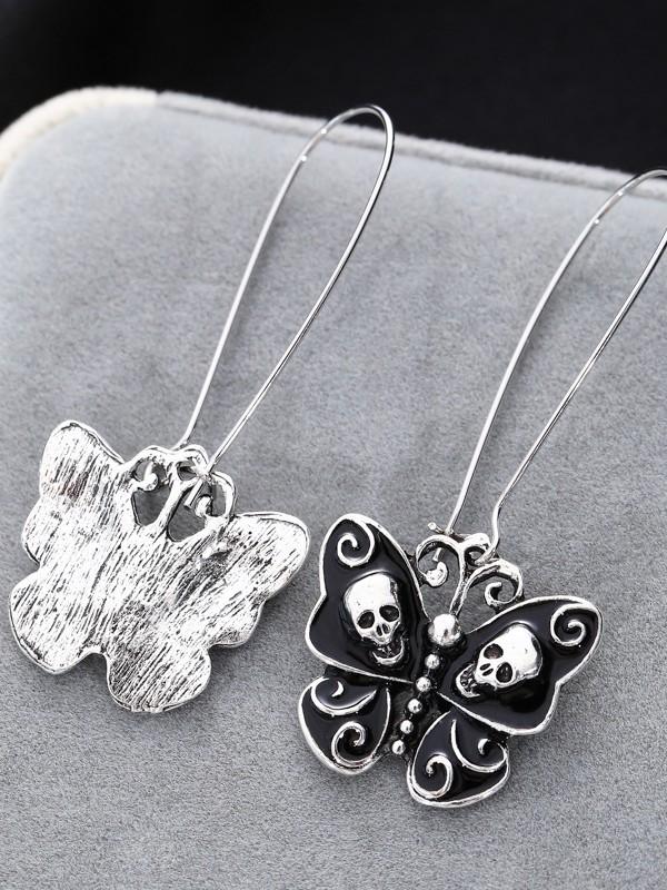 Vintage oil drop skull bow earrings
